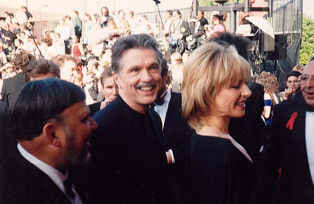 Tom Skerritt smiling on the red carpet at the 1994 Emmy Awards